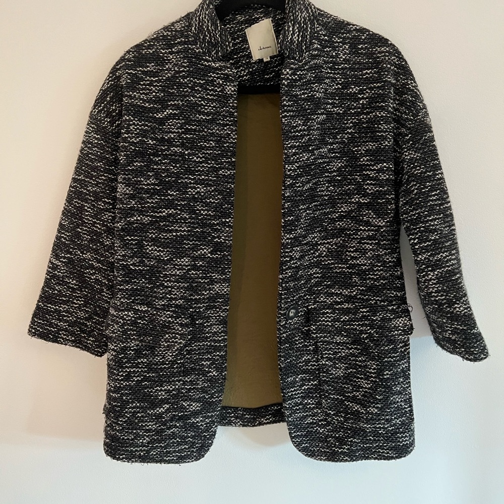 Sophisticated black and white coat with chic mid length sleeves (Anthropologie)
